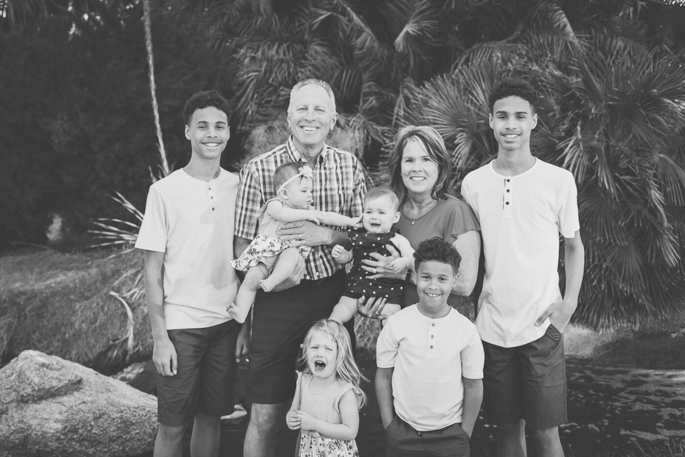 Grandparents and grandkids shot with some kids crying and not looking at camera.