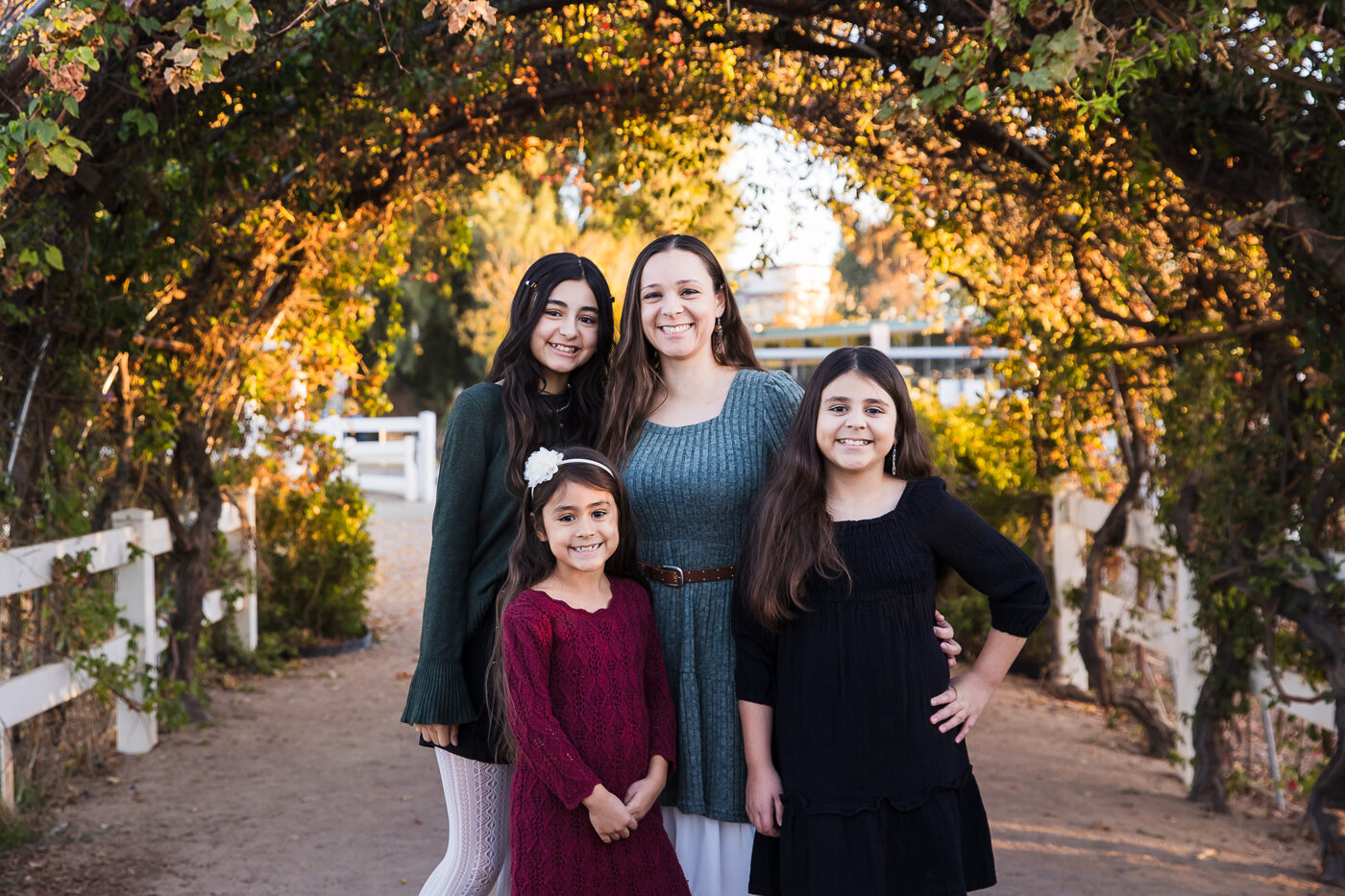 My family under a beautiful arch of vines.