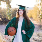 Basha high senior in the desert holding a basketball